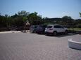 Parkiralište Punat, Krk, Parkiralište 16122 - Apartmani blizu mora sa šljunčanom plažom.