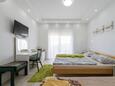 Spavaća soba Stobreč, Spavaća soba u smještaju tipa room, dostupna klima i WiFi.