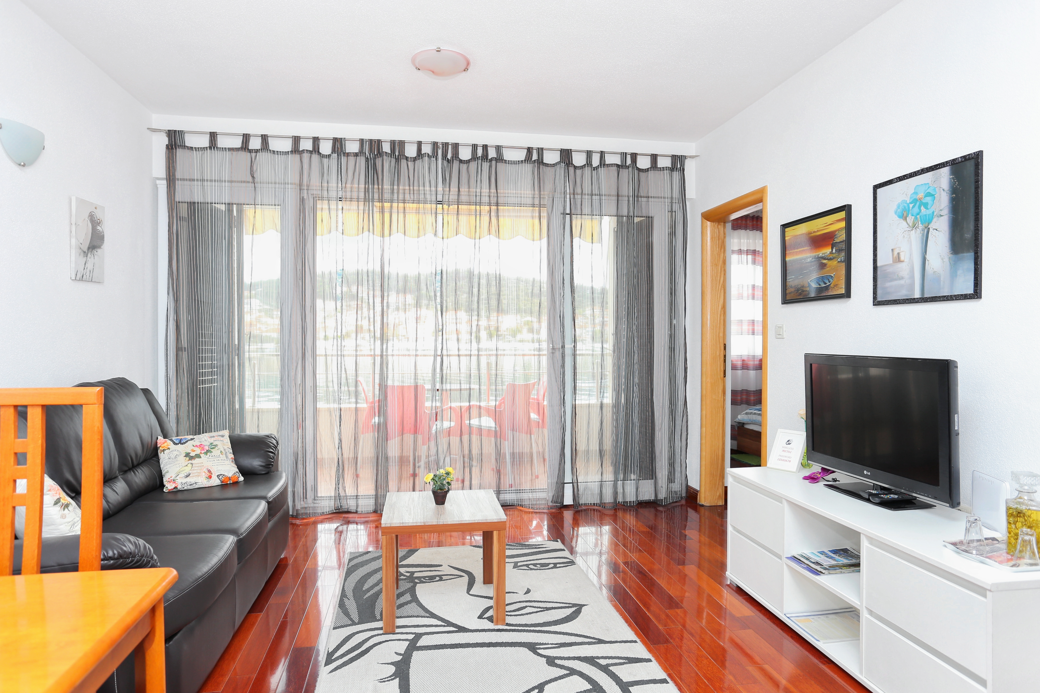 One bedroom apartment with terrace and sea view Trogir (A-16211-b)