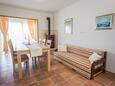 Salle à manger Sutivan, Salle à manger dans l’hébergement en type apartment, climatisation disponible et WiFi.