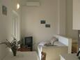 Obývací pokoj Palit, Obývací pokoj v ubytování typu studio-apartment, s klimatizací a WiFi.
