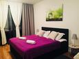 Ložnice Zagreb, Ložnice v ubytování typu studio-apartment, s klimatizací, domácí mazlíčci povoleni a WiFi.