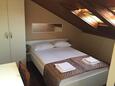 Biograd na Moru, Ložnice v ubytování typu room, s klimatizací a WiFi.