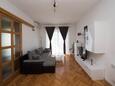 Obývací pokoj Brela, Obývací pokoj v ubytování typu apartment, s klimatizací a WiFi.