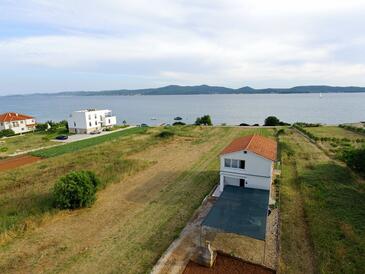 Sukošan, Zadar, Objekt 16646 - Apartmaji v bližini morja s kamnito plažo.