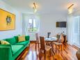 Living room Murter, Living room in the apartment, air condition available, (pet friendly) and WiFi.