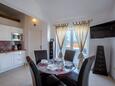 Dining room Murter, Dining room in the apartment, air condition available, (pet friendly) and WiFi.