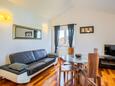 Living room 4 Murter, Living room 4 in the house, air condition available, (pet friendly) and WiFi.