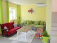 Living room Peroj, Living room in the house, air condition available and WiFi.