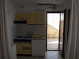 Kuchyně Vir, Kuchyně v ubytování typu studio-apartment, s klimatizací a WiFi.