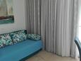 Obývací pokoj Makarska, Obývací pokoj v ubytování typu apartment, s klimatizací a WiFi.