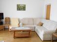 Living room Kaštel Štafilić, Living room in the apartment, air condition available and WiFi.
