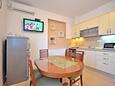 Dining room Podstrana, Dining room in the apartment, air condition available and WiFi.