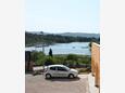 Parking lot Bilice, Krka, Parking lot 16904 - Apartments near sea with pebble beach.