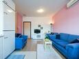 Split, Living room in the apartment, air condition available and WiFi.