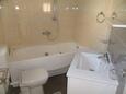 Bathroom 1 Jezera, Bathroom 1 in the apartment, (pet friendly) and WiFi.
