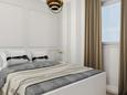 Спальня 1 Novalja, Спальня 1 в размещении типа apartment, WiFi.