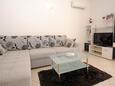 Living room Rogoznica, Living room in the apartment, air condition available, (pet friendly) and WiFi.