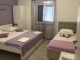 Slaapkamer Krilo Jesenice, Slaapkamer in the studio-apartment, air condition available en WiFi.
