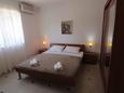 Ložnice Novalja, Ložnice v ubytování typu room, s klimatizací a WiFi.