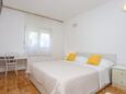 Bedroom 1 Podstrana, Bedroom 1 in the apartment, air condition available and WiFi.