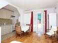 Dining room Podstrana, Dining room in the apartment, air condition available and WiFi.