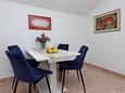 Suha Punta, Comedor in the apartment, air condition available y WiFi.