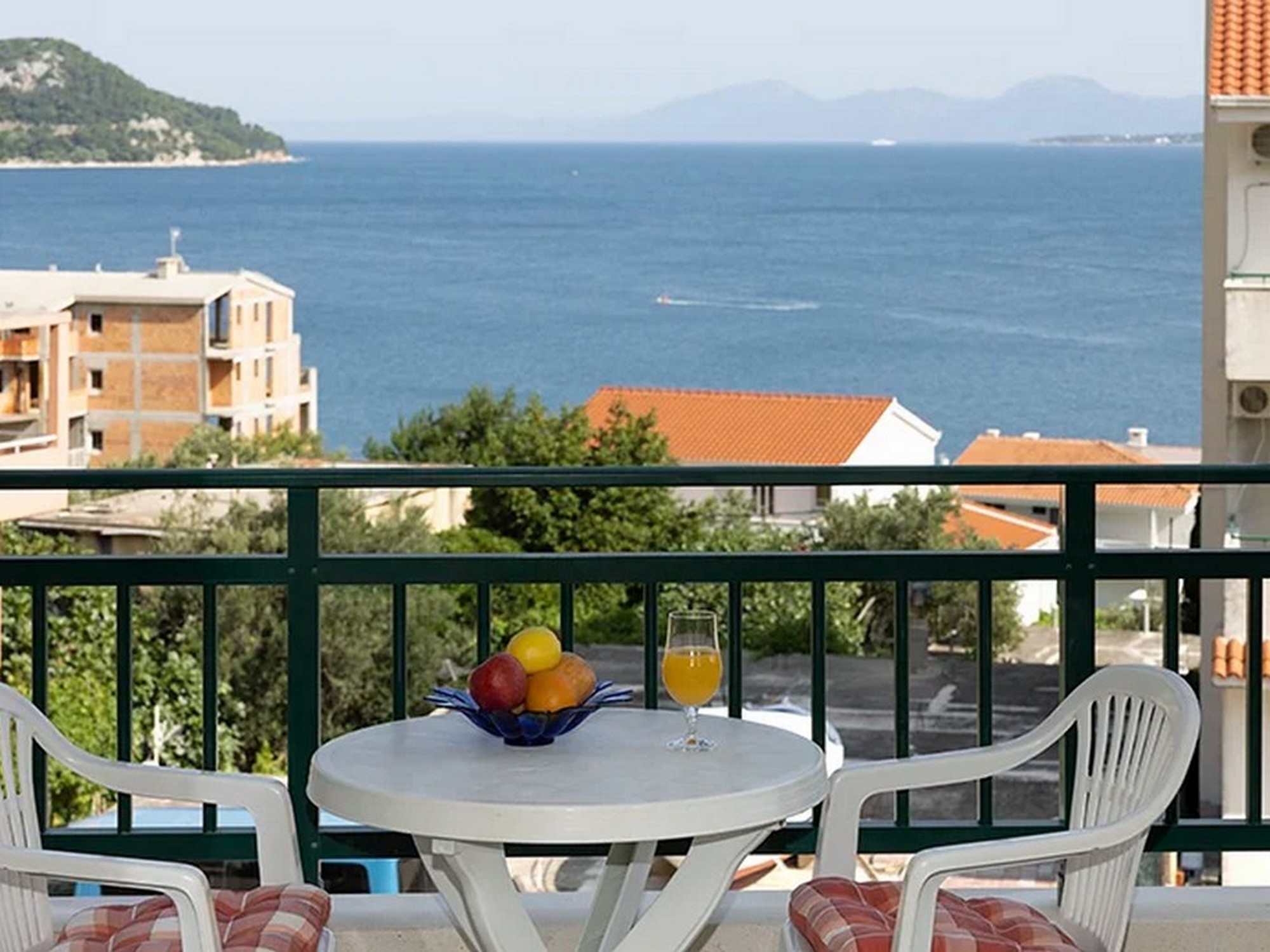 Two bedroom apartment with terrace and sea view Igrane, Makarska (A-17292-b) Two bedroom apartment with terrace and sea view Igrane, Makarska (A-17292-b)