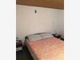 Spavaća soba 1 Susak, Spavaća soba 1 u smještaju tipa apartment, dostupna klima.