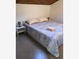 Spavaća soba 1 Susak, Spavaća soba 1 u smještaju tipa apartment, dostupna klima i WiFi.