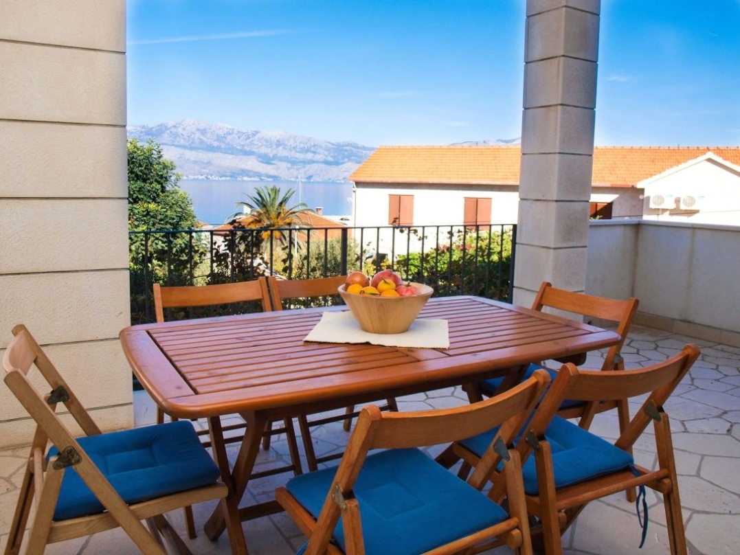 Two bedroom apartment with terrace and sea view Postira, Brač (A-17323-a)