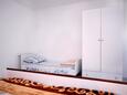 Tri Žala, Bedroom in the apartment, air condition available and WiFi.