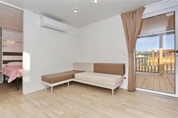 Dnevna soba Pašman, Dnevna soba v nastanitvi vrste apartment, dostopna klima in WiFi.