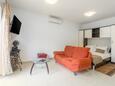 Obývací pokoj Vrsar, Obývací pokoj v ubytování typu studio-apartment, s klimatizací, domácí mazlíčci povoleni a WiFi.