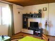 Obývacia izba Artatore, Obývacia izba v ubytovacej jednotke apartment, klimatizácia k dispozícii, domáci miláčikovia povolení a WiFi.