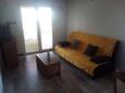 Silba, Sala de estar in the apartment, air condition available y WiFi.