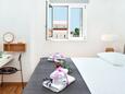 Spavaća soba 1 Omiš, Spavaća soba 1 u smještaju tipa apartment, WiFi.