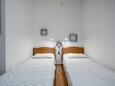 Rabac, Ložnice 2 v ubytování typu apartment, domácí mazlíčci povoleni a WiFi.