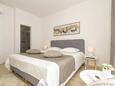 Спальня 1 Rastići, Спальня 1 в размещении типа apartment, доступный кондиционер и WiFi.