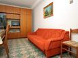 Lumbarda, Sala de estar in the apartment, (pet friendly) y WiFi.