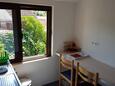 Salle à manger Seget Vranjica, Salle à manger dans l’hébergement en type apartment, climatisation disponible, animaux acceptés et WiFi.