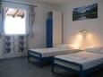 Ložnice 2 Lopar, Ložnice 2 v ubytování typu apartment, domácí mazlíčci povoleni a WiFi.