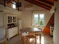 Dining room Lumbarda, Dining room in the apartment, air condition available, (pet friendly) and WiFi.