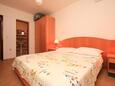 Dingač - Borak, Bedroom 1 in the apartment, air condition available and WiFi.