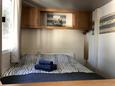 Ložnice 1 Novalja, Ložnice 1 v ubytování typu apartment, domácí mazlíčci povoleni a WiFi.
