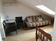 Obývací pokoj Makarska, Obývací pokoj v ubytování typu studio-apartment, s klimatizací a WiFi.