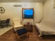 Obývacia izba Gustirna, Obývacia izba v ubytovacej jednotke apartment, klimatizácia k dispozícii a WiFi.