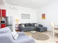 Obývací pokoj Kaštel Novi, Obývací pokoj v ubytování typu apartment, s klimatizací a WiFi.