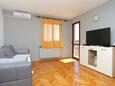 Living room Makarska, Living room in the apartment, air condition available, (pet friendly) and WiFi.