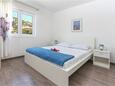 Bedroom Hvar, Bedroom in the apartment, air condition available and WiFi.